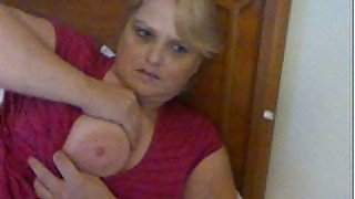 Bosomy blond mom mauls her huge jugs while flirting through webcam