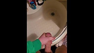 secretly jerking off in the bathroom