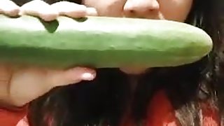 Teasing fat bitch takes a cucumber