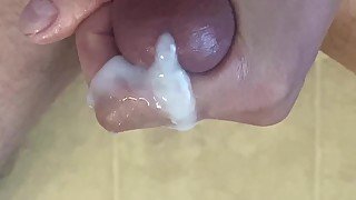 WATCH A THICK MASSIVE LOAD OF CUM OOZE OUT WHILE DADDY STROKES HIS OWN BIG COCK