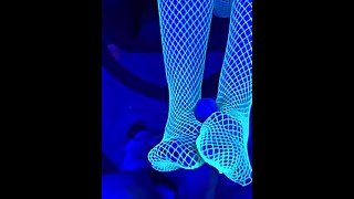 Black light party footjob, masturbation, and fuck in neon fishnets