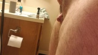 Pumped FTM cock stands to pee