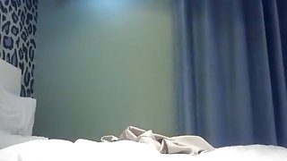 Asian guy fucks his mistress for the first time in a hotel and captures it