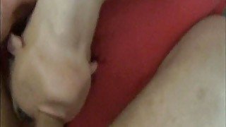 Two amateur bitches suck on cock in an orgy