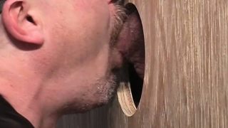 Mustachioed gay has found a hard rod in a glory hole to suck