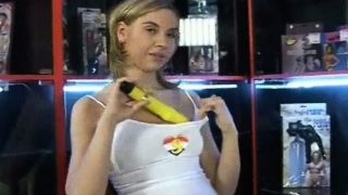 Blonde teen in a sex shop