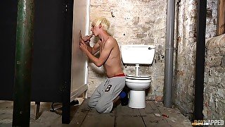 Young and horny gay Max Brown sucks a penis trought the wall