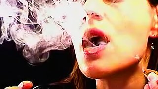 Milf brunette babe smoking on camera