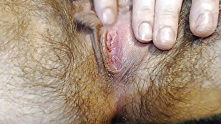 Wet hairy pussy close up