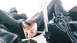 Hooded CD in latex bodysuit fucked by machine and play with ass-pussy