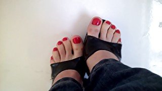 Girl In Jeans Has Her Sexy Amateur Feet With Red Nail Polish On The Camera