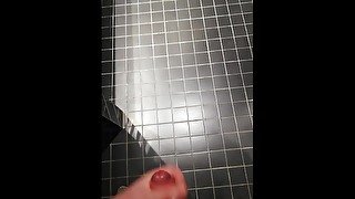 Masturbating in a public bathroom