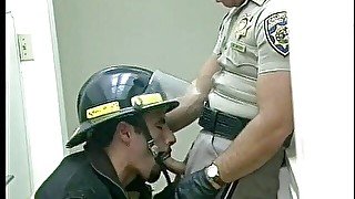 Gay fireman sucks a cock of a police officer