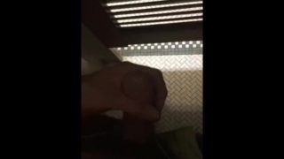 Jacking off in public restroom