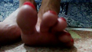 Red long toenails teasing