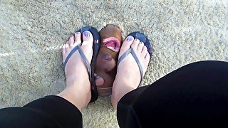 Beautiful feet trample ugly face