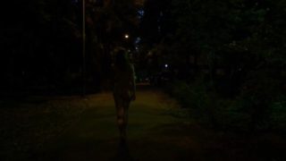 Mystery naked woman on the street at night