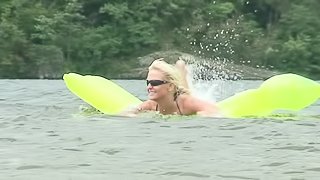 She meets a guy at the lake and up surfing on his cock