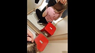 A quick blowjob in a public fitting room