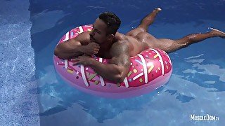 Hot muscle man in pool