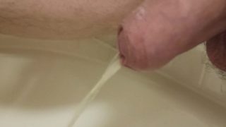 foreskin pissing closeup, uncut