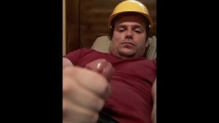 Construction Worker Builds An Erection