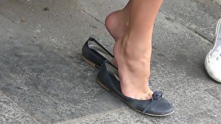 Bored Amateur Brunette Caught Dangling Her Ballerina Shoes In Public