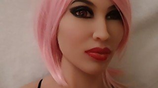 Perfect sexdoll with massive boobs giving head