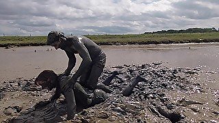 Mud Wrestling--Who Wins, Women or Man!