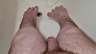 Midget shows his feet and then cums on them