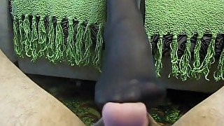 Slut In Black Nylon Stockings Rubbing And Touching A Cock With Her Hot Feet