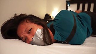 Brunette leather boots tape gagged