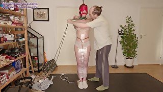 Girl Is Mummified In Plastic Wrap To Pole With Magic Wand