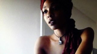 Dazzling ebony girl with fabulous tits and ass rubs her cunt