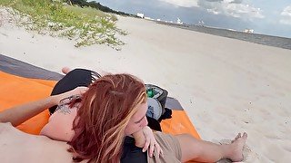 Slutty Redhead gives me a risky public blowjob on the beach throatpie