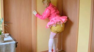 Transsexual sister in a short skirt and diapers