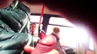 Two girls watch bus flasher