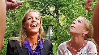 Hardcore group sex in outdoors with two stunning blonde wives