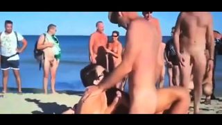 Blowjob on public beach