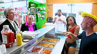 Cute girls sucking dick and fucking at a hot dog joint