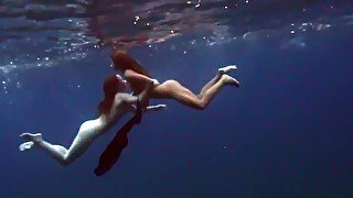 Underwater erotics with hot girls in the sea