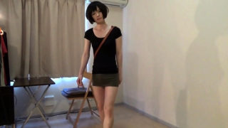 crossdresser wearing a mini skirt