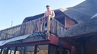 Bikini slut pissing from a balcony