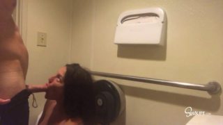 Brunette skank takes it from behind in public toilet