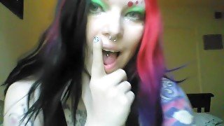 Goth girl plays with her mouth and spits