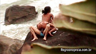 Young people having sex on the beach in Brazil