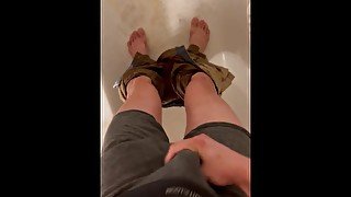 Horny guy jacks off and cums after pee pants accident