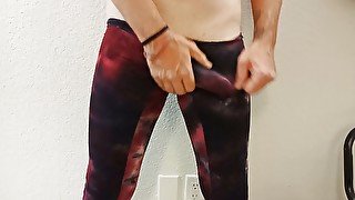 A dude with a huge cock jerks off in yoga pants