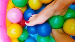 Ball pool feet play