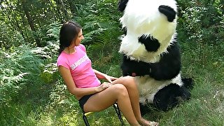 Playful brunette teen Molly undresses in front of guy in Panda costume